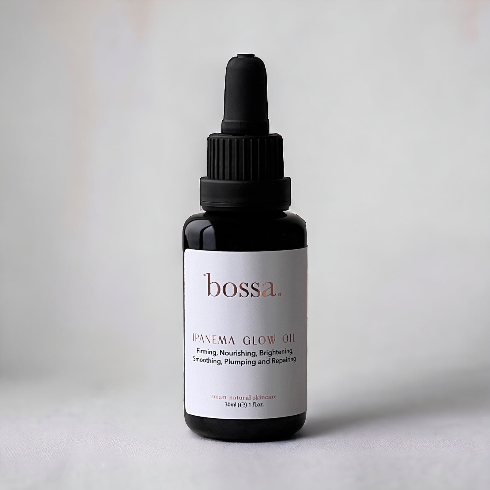 Bossa Ipanema Glow Face Oil bottle with golden botanical blend for radiant skin