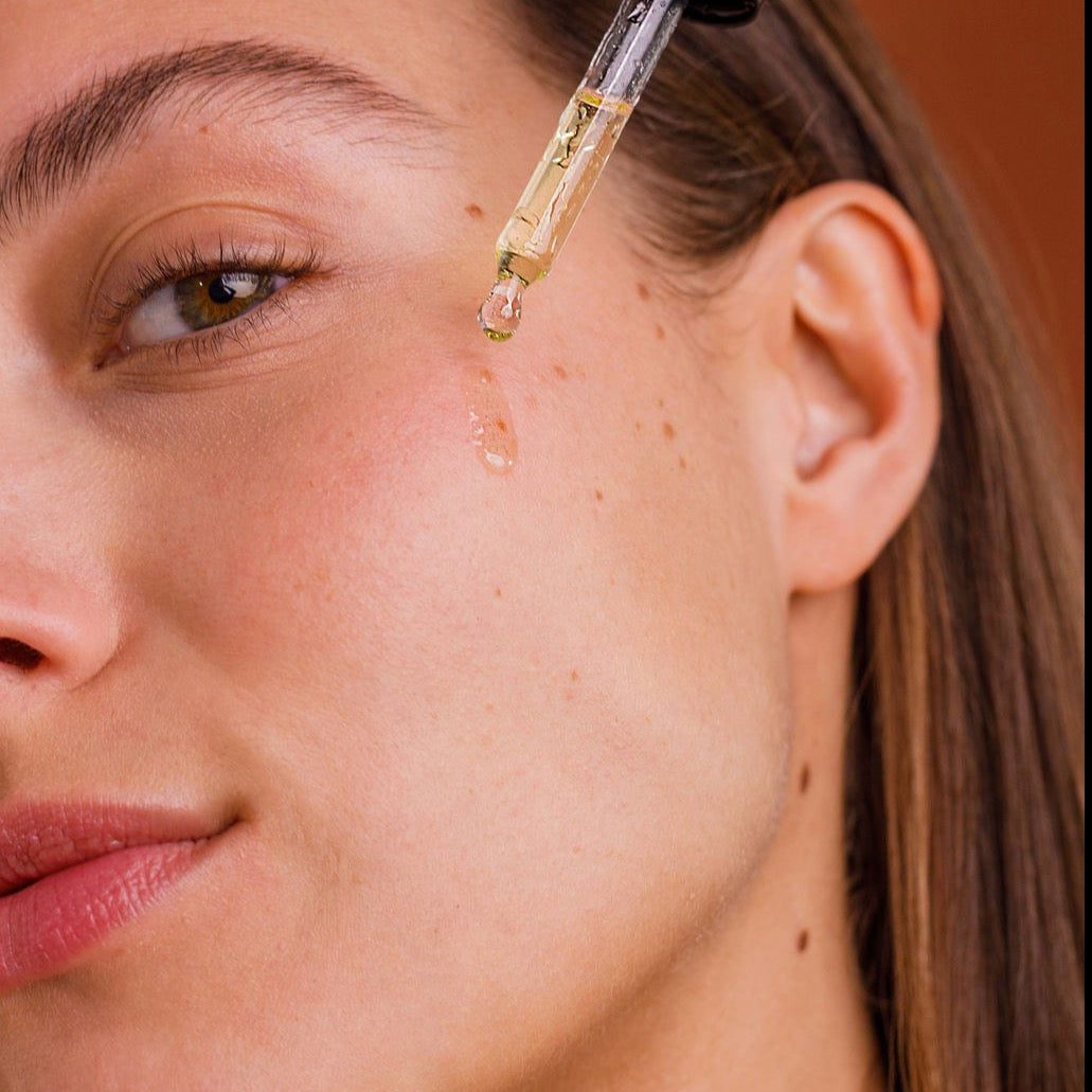 Facial oil texture showing lightweight, dewy finish for glowing skin